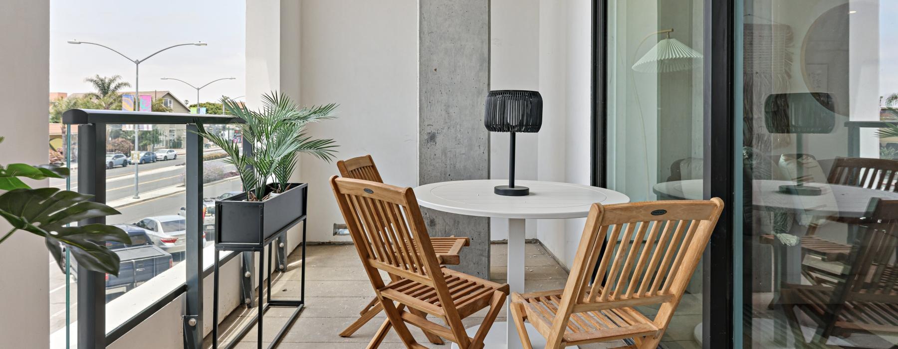 a table and chairs on a deck