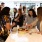 Friends gathering at an outdoor kitchen