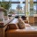 indoor lounge with chair and lamp at The Nash Apartments in North Park, San Diego