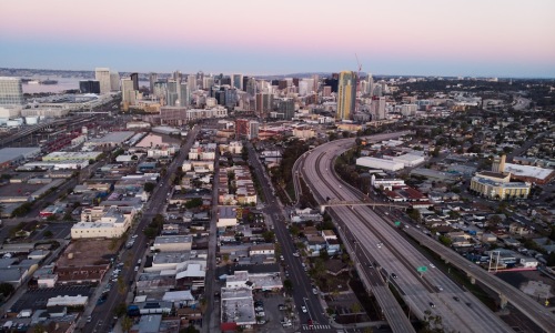Rooftop bar overlooking San Diego skyline at sunset - rooftop marriott san diego